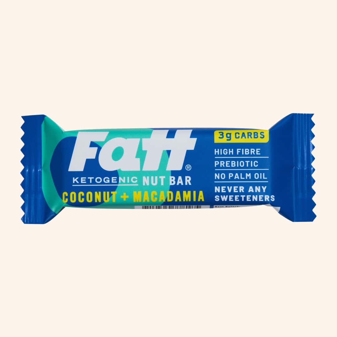 Fatt - Coconut + Macadamia 1 Fatt - Coconut + Macadamia bar on a cream background