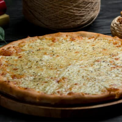 close up photo of a low carb chicken alfredo pizza