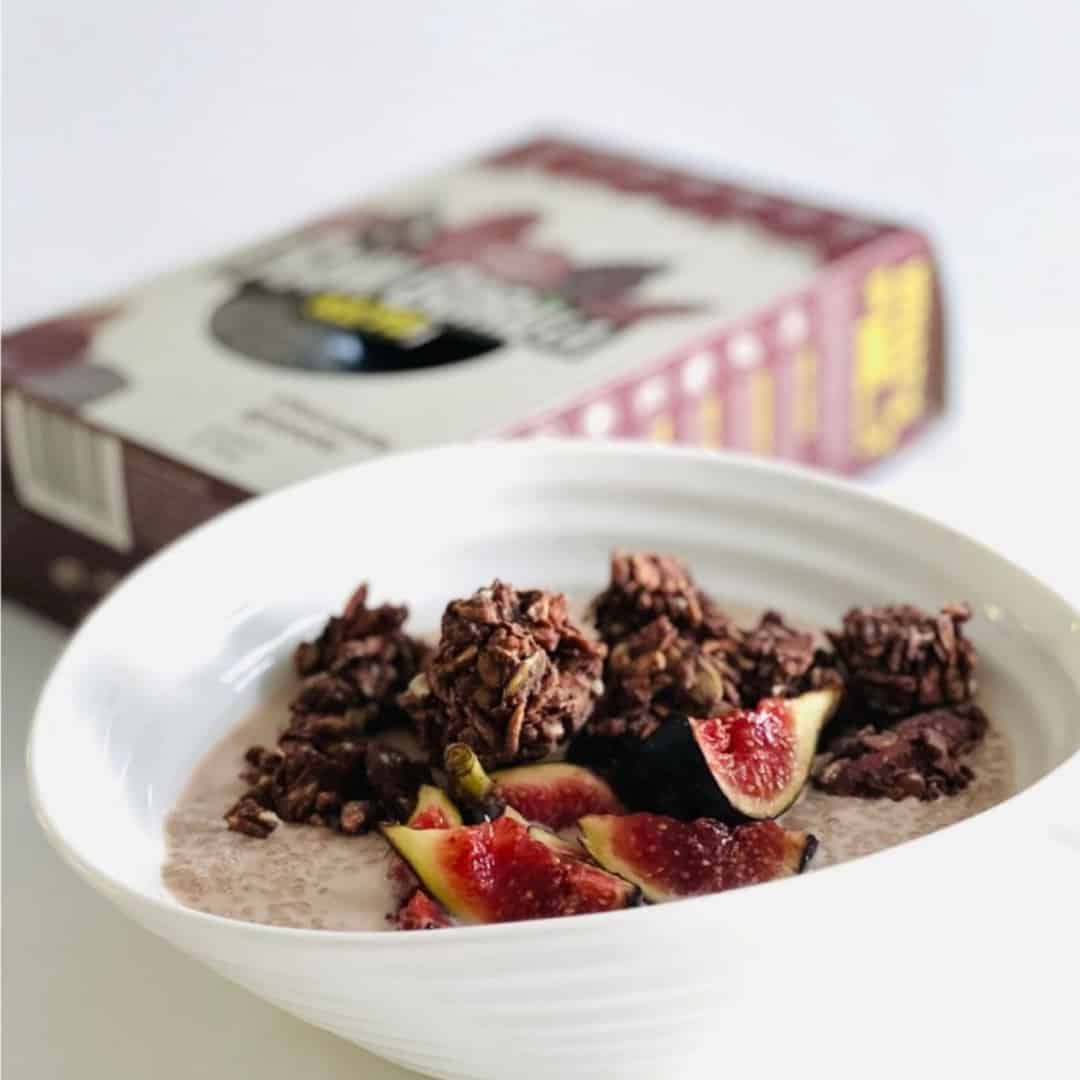 Raw Gorilla - Chocolate Granola 2 raw gorilla chocolate granola in a white bowl with yoghurt and figs.